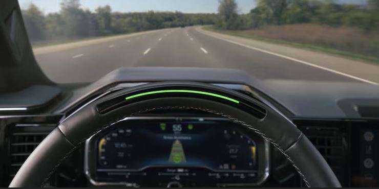 Chevrolet Super Cruise green steering wheel light indicating hands-free mode